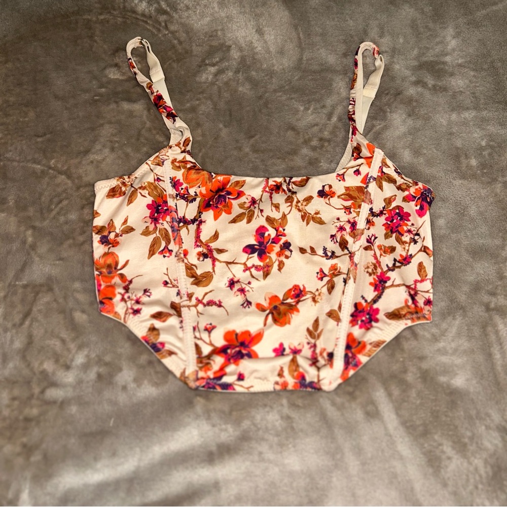 Classy floral corset top with adjustable straps, featuring a cream combination